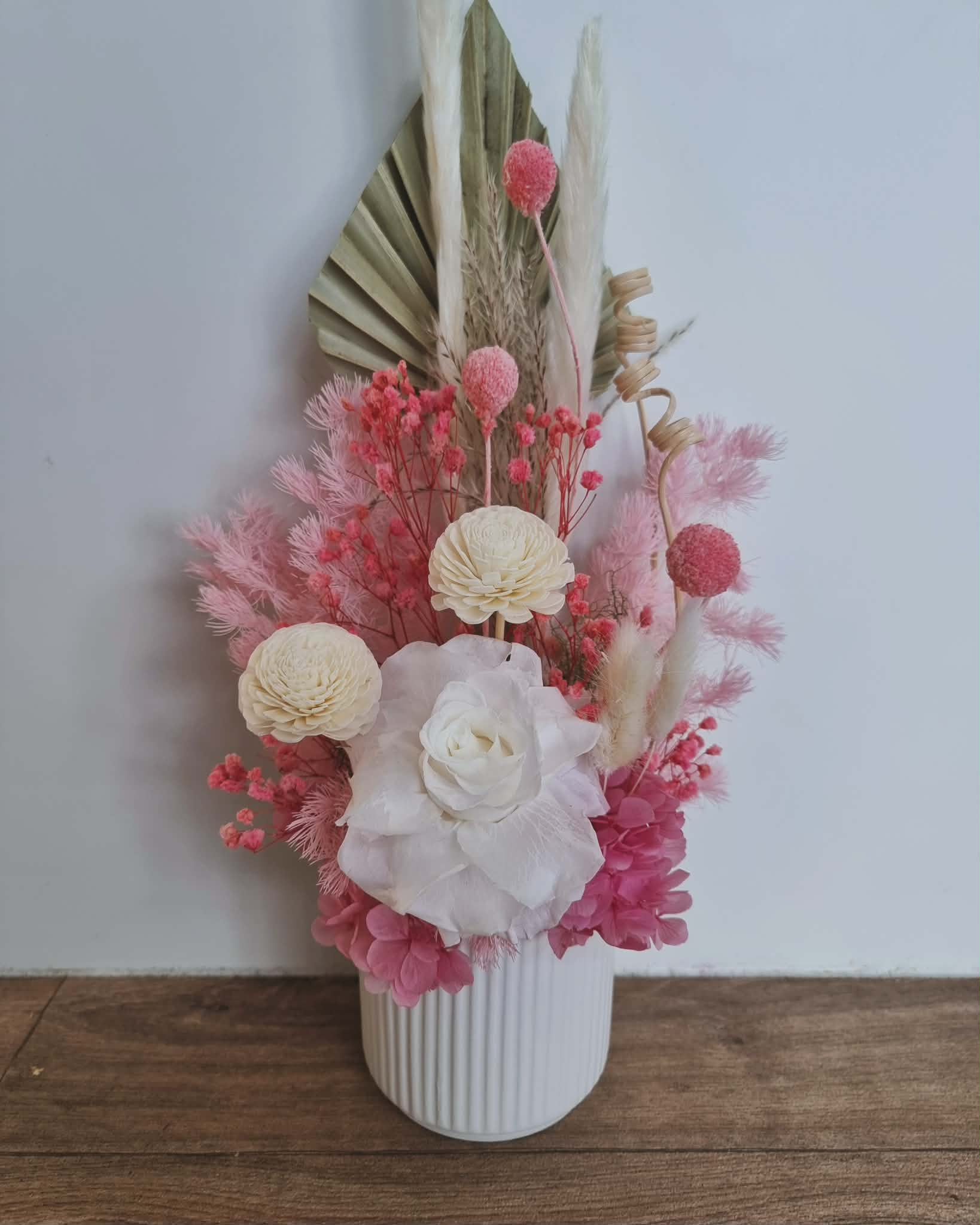 Small pink dried flower arrangement